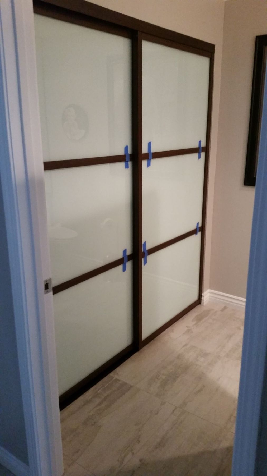 Modern sliding closet doors with frosted glass