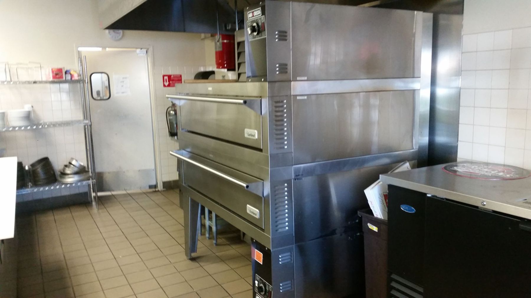 Commercial kitchen renovation with stainless steel