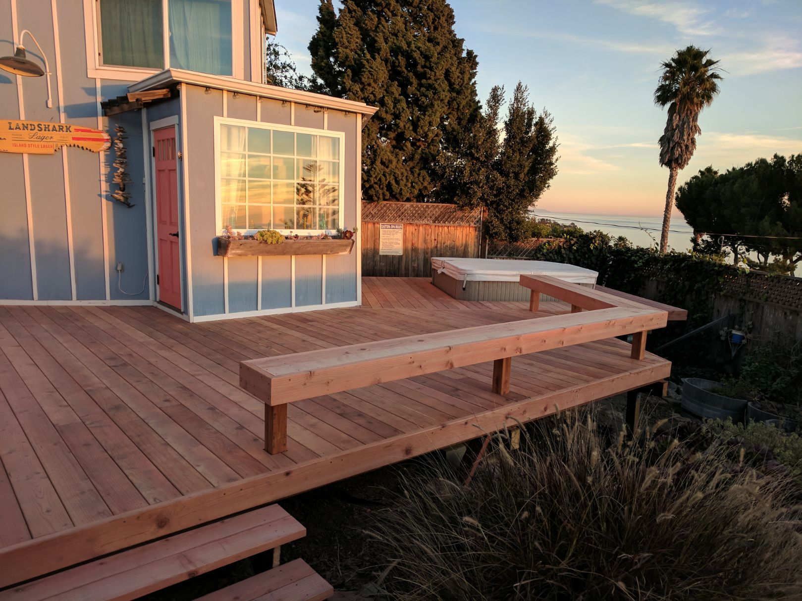 Custom wooden deck with built-in bench