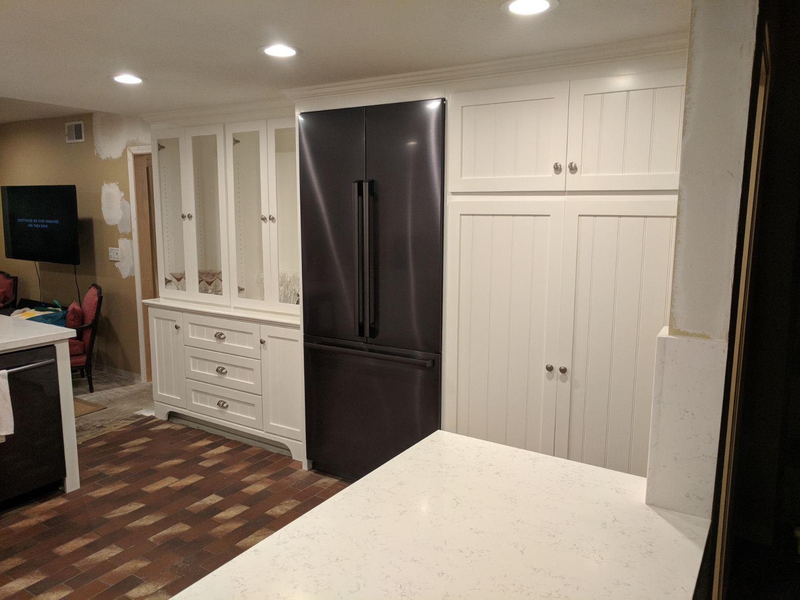 Kitchen renovation with custom cabinetry and quartz