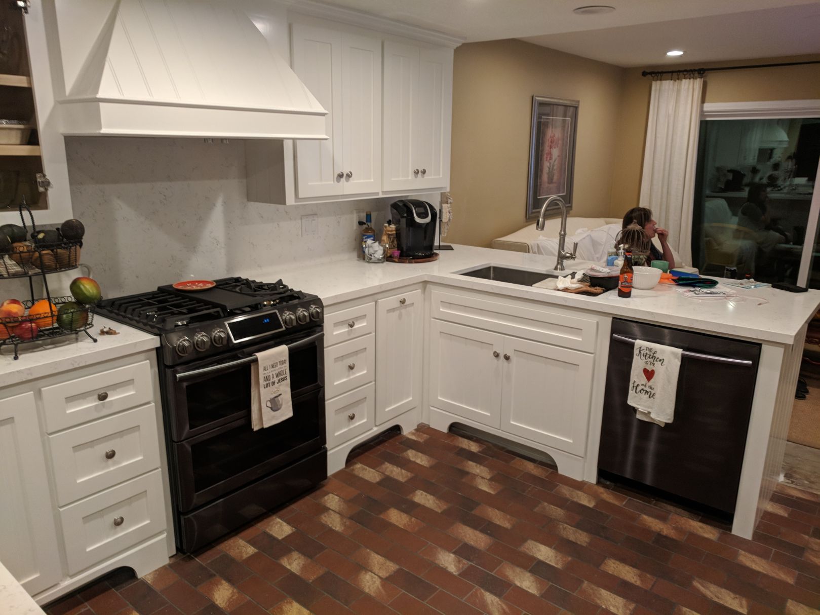 Modern kitchen renovation with new tile flooring